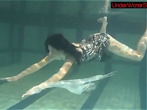 Blackhaired ultra-cutie Irina underwater